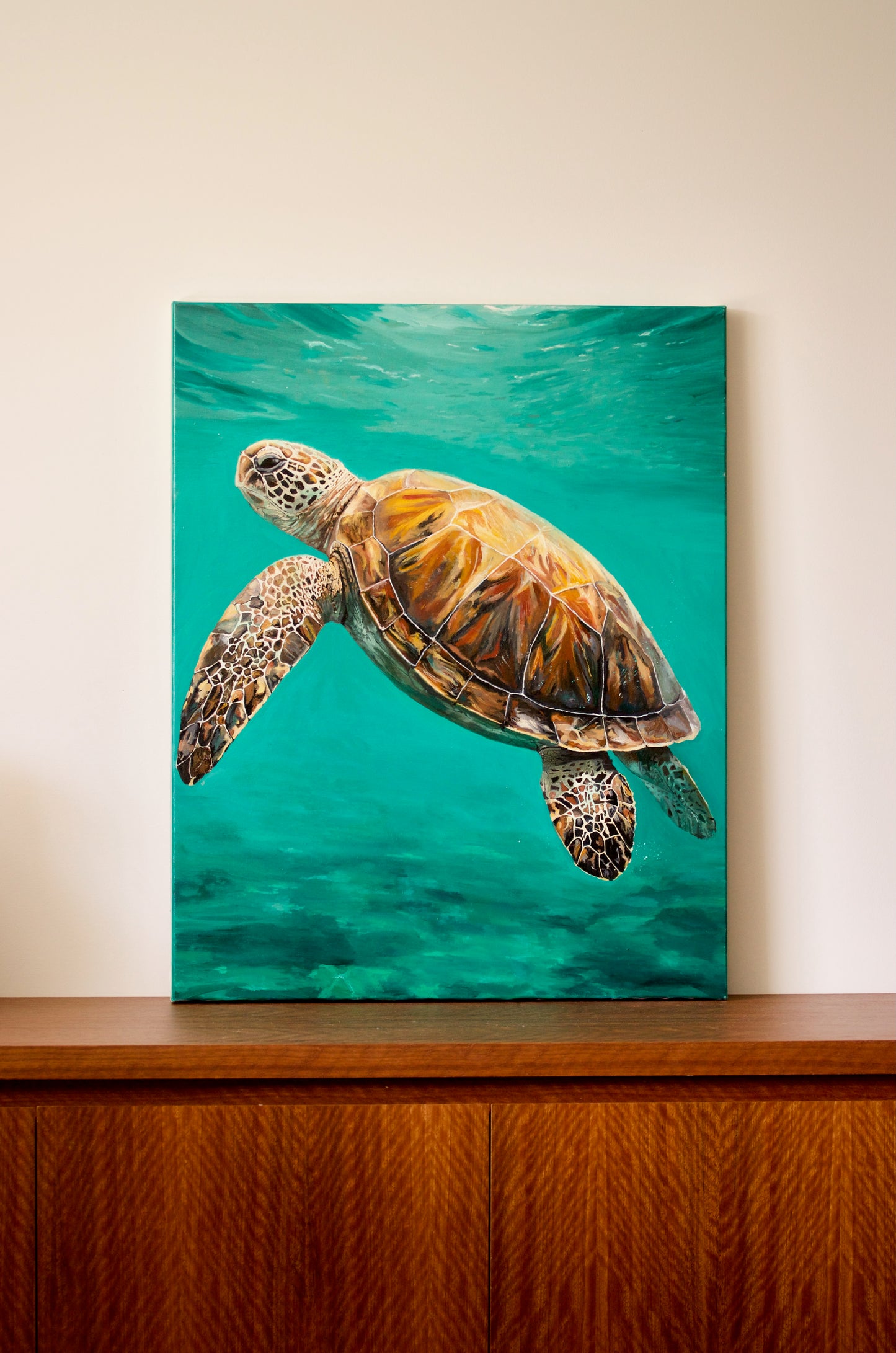 Original oil painting of a sea turtle ocean background by Bella Munday